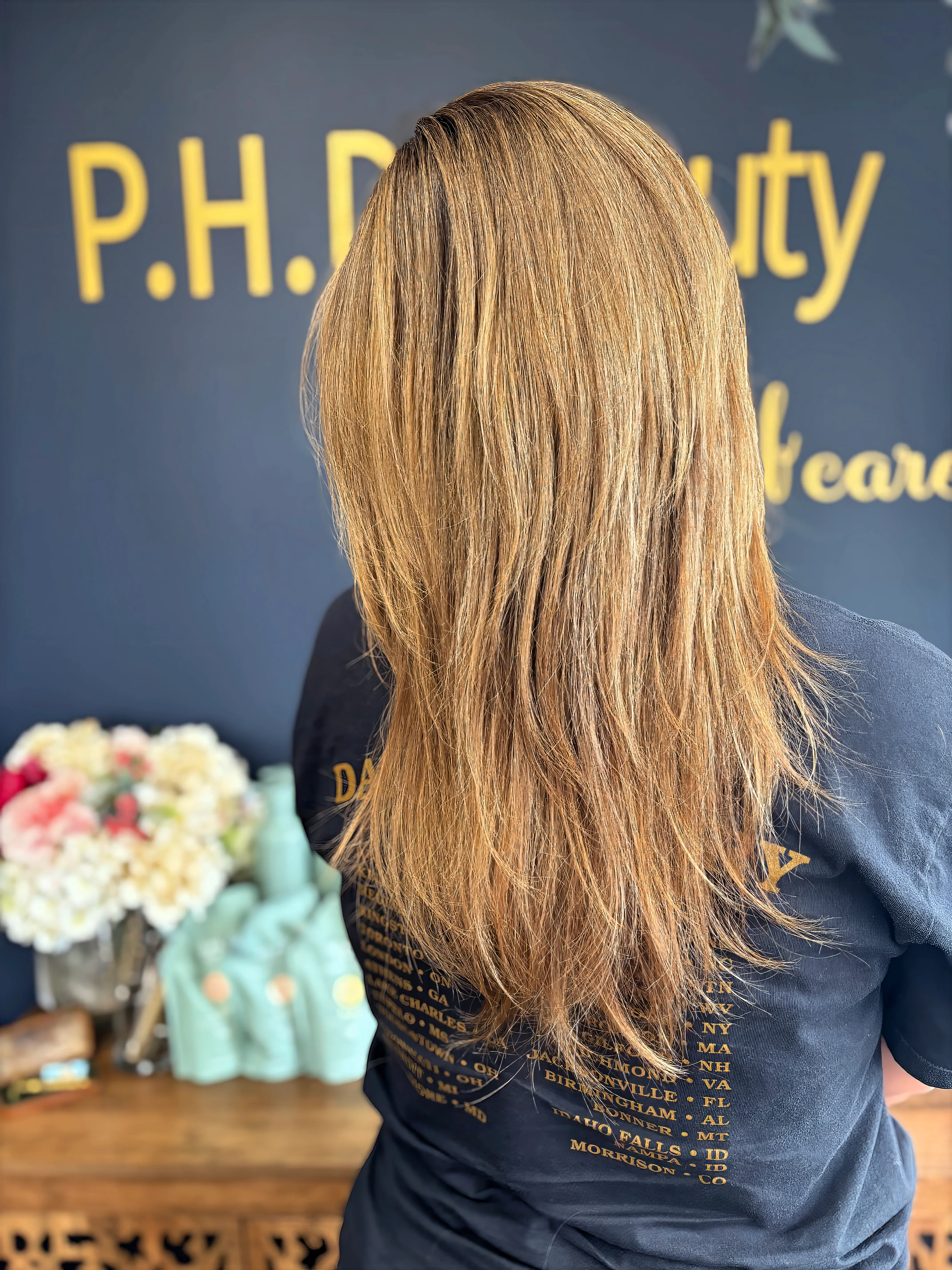 Client blonde hair back view