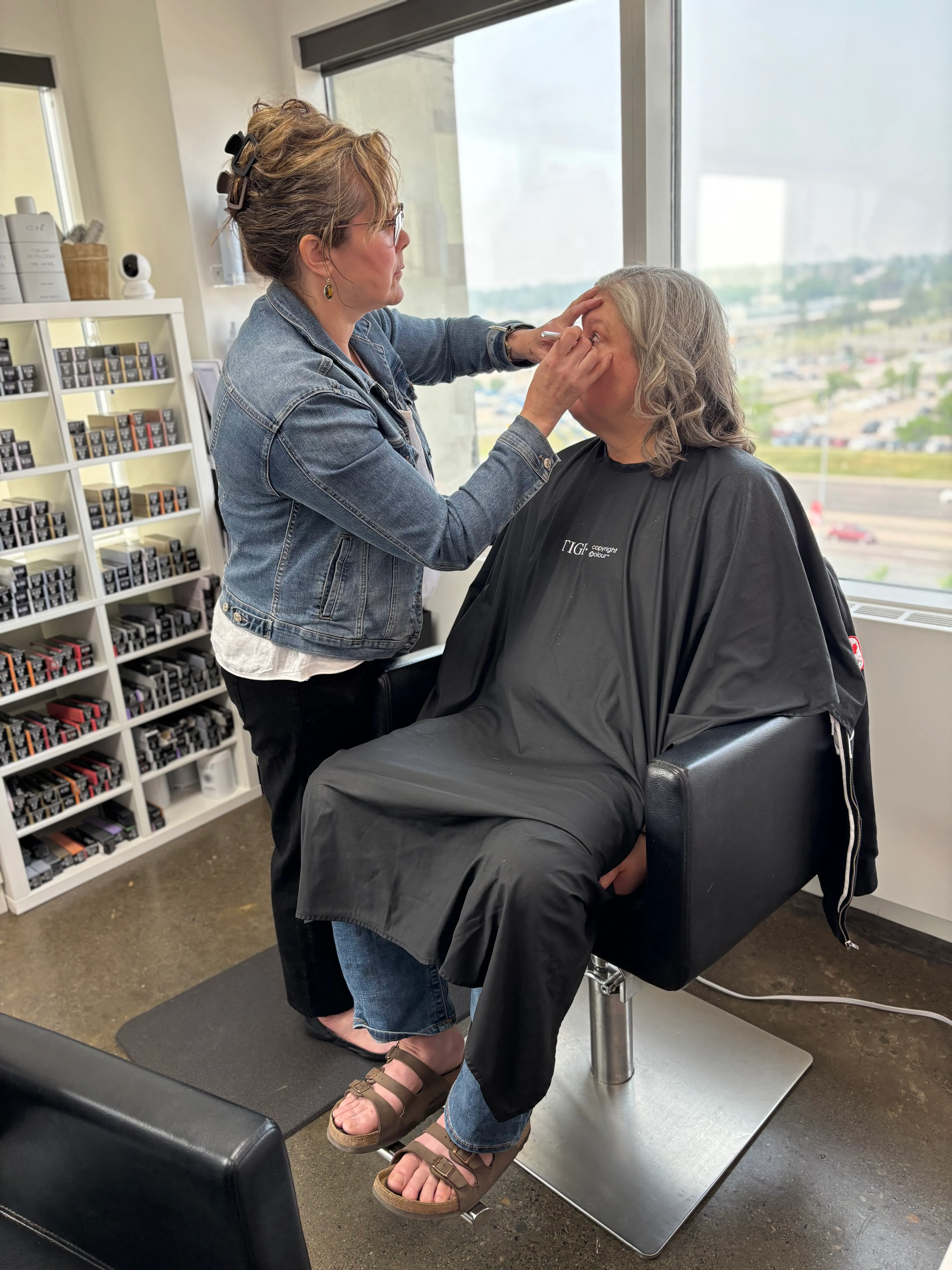 Client in styling chair